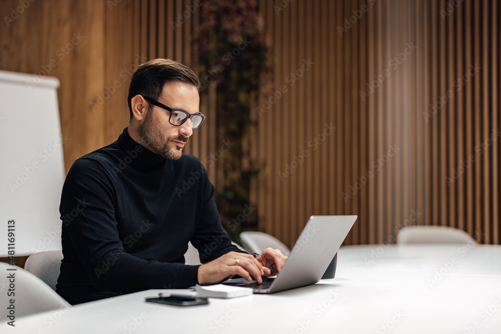 Hardworking caucasian employee, writing an email to his boss. Hardworking caucasian employee, writing an email to his boss.