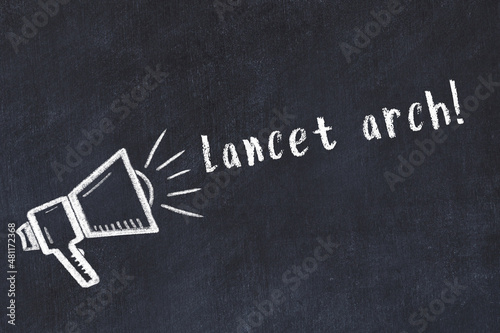 Chalk loudspeaker and inscription lancet arch on black chalkboard