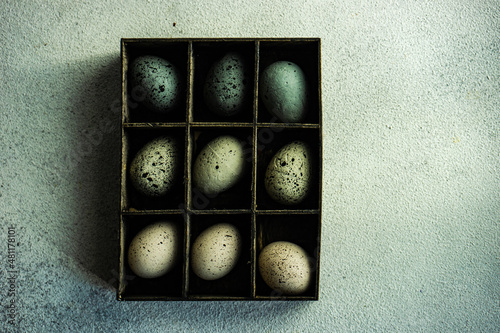 Assorted Easter eggs in a wooden box