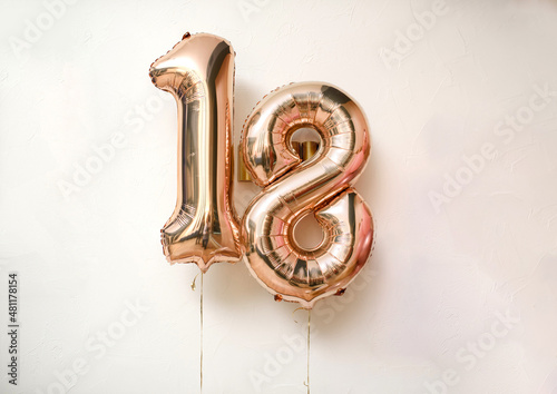 18 years balloons on the white wall. Adulthood concept