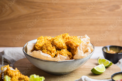 vegan chicken nuggets on a table with sides