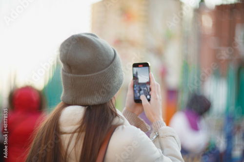 woman shooting on mobile tik tok photo