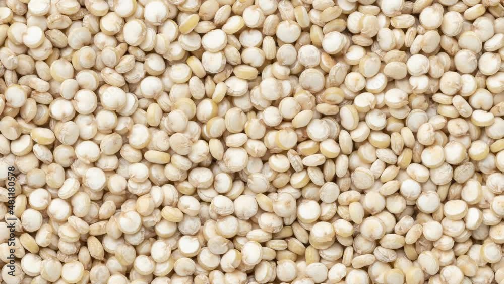 Top view, closeup of raw quinoa grains. Food backdrop Top view, closeup of raw quinoa grains. Food backdrop