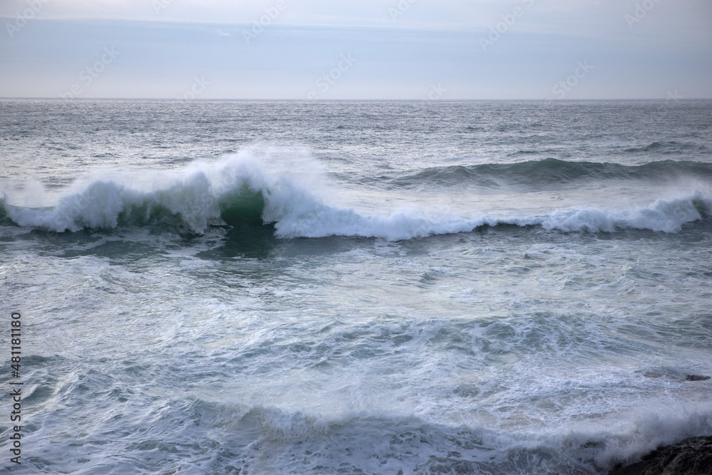 Waves crash in from Atlantic swells at Chapel Porth beach, Cornwall