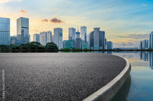 Tela Panoramic skyline and modern commercial office buildings with empty circular square in Shenzhen, China
