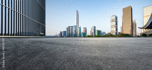 Fototapeta Naklejka Na Ścianę i Meble -  Asphalt road and city skyline with modern commercial office buildings in Shenzhen, China.