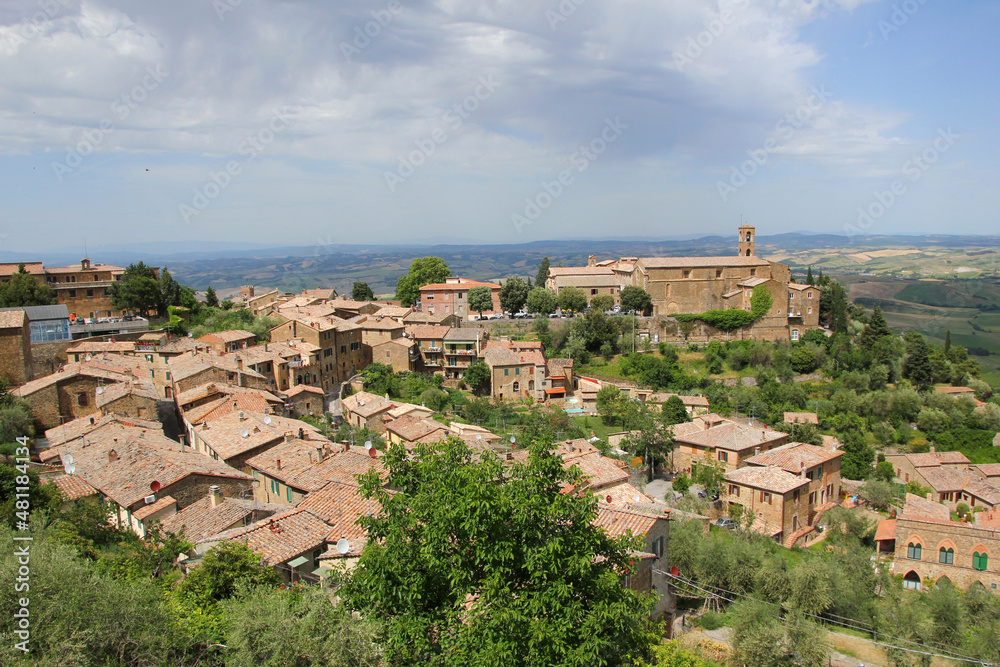 The view on the historic city of Montalcino in Tuscany, Italy, high on the hill above the rural Tuscan countryside. 