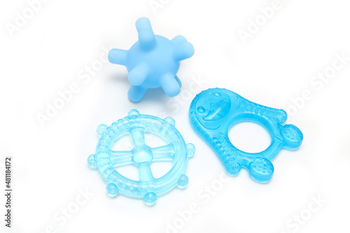 The small group of different toys for babies. They can play and bite into them to support growing of the teeth. 
