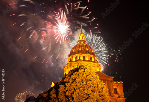 Celebratory colorful fireworks over the Les Invalides (The National Residence of the Invalids) at night. Paris, France #481185339