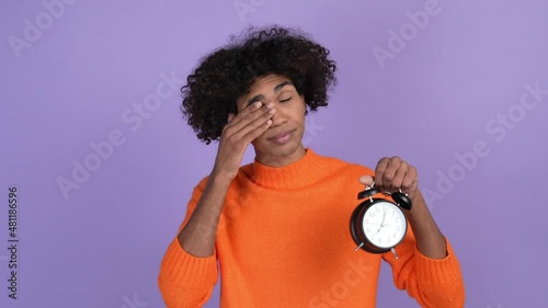 Tired guy yawn had insomnia hold alarm isolated shine color background photo