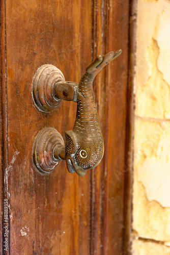 Ornate door decoration traditional homes in Valletta - Malta