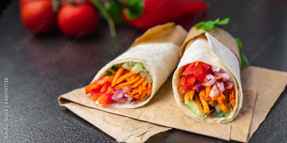vegetarian shawarma doner kebab burrito filling vegetable pita veggie bread vegetables dish on the table healthy meal snack copy space food background top view vegan food vegetarian shawarma doner kebab burrito filling vegetable pita veggie bread vegetables dish on the table healthy meal snack copy space food background top view vegan food