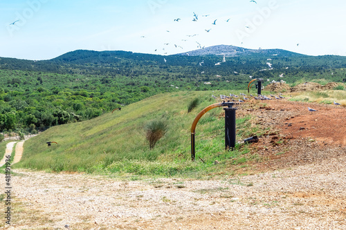 Landfill site degassing to prevent gas explosion
