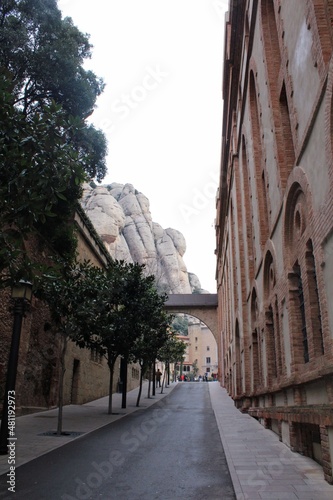 Fototapeta Naklejka Na Ścianę i Meble -  Alley on Montserrat Monastery exterior, Catalonia, Spain.