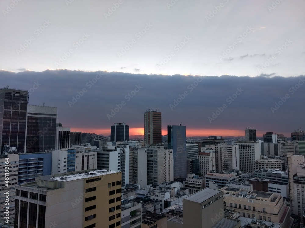 Fototapeta premium Sunset view of downtown Rio de Janeiro on a cloudy day, Brazil.