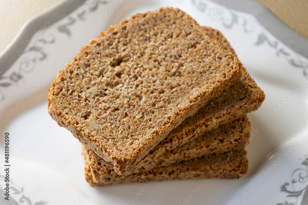 wheat bread slices close up on white background wheat bread slices close up on white background