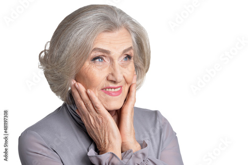 Portrait of emotional senior woman posing isolated on white background