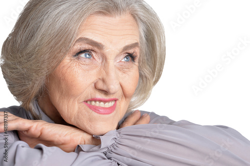 Portrait of emotional senior woman posing isolated on white background
