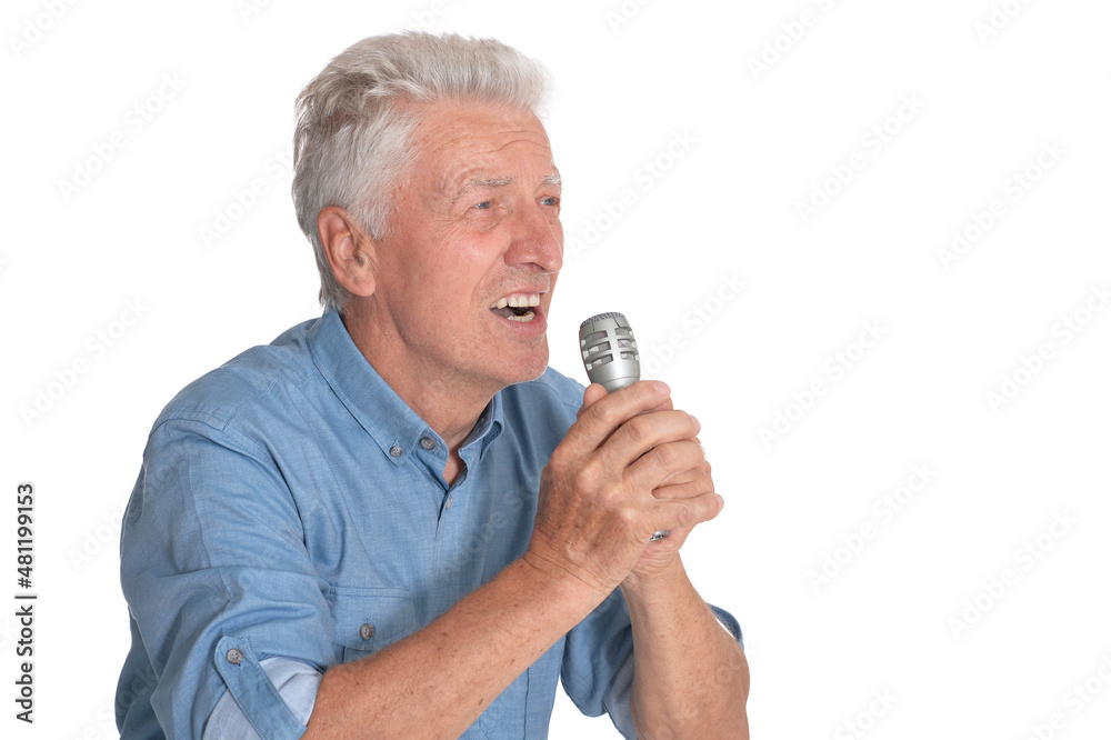 Portrait of senior man singing with microphone Portrait of senior man singing with microphone