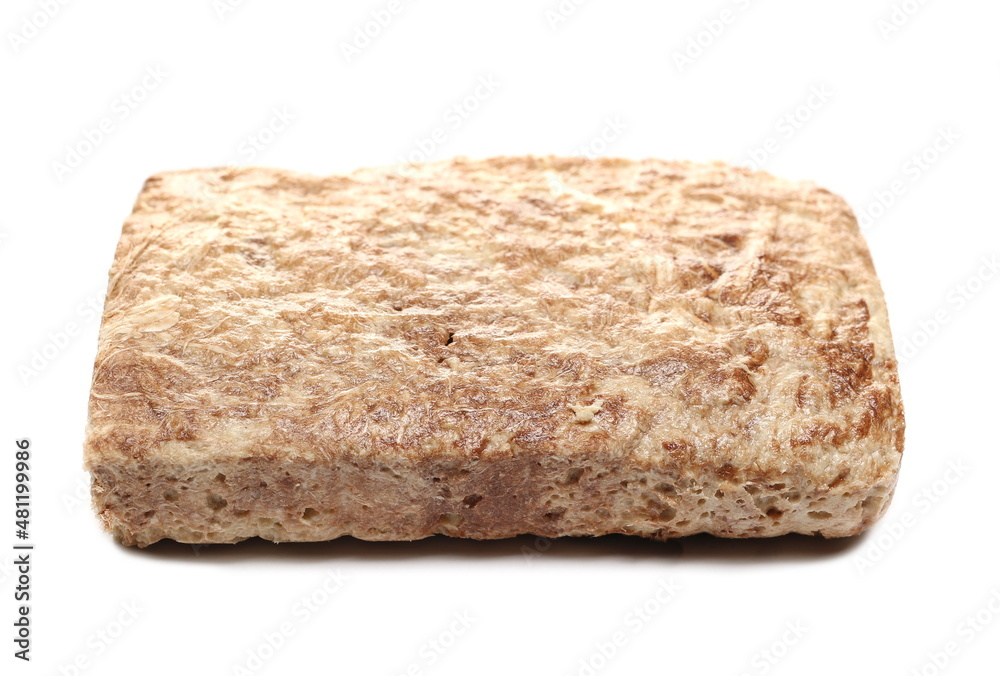Tahini halvah, sesame paste isolated on white Tahini halvah, sesame paste isolated on white