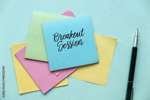 фотографія Breakout session concept with a multicolor paper memo note and pen
