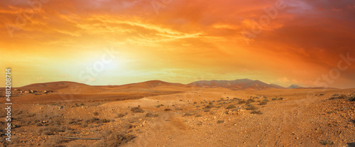 Orange sky in the desert during sunset