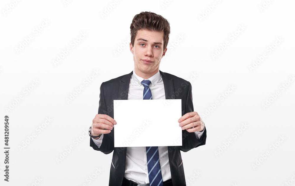 Skeptical man with blank paper in studio