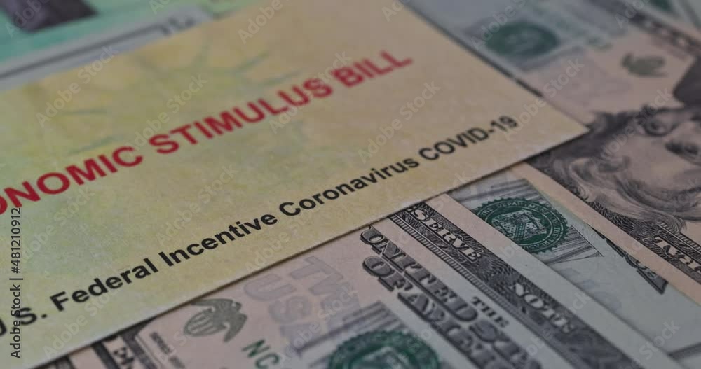 USA dollar cash banknote with United States Treasury relief check on the Form 7200, Advance Payment of Employer Credits Due to COVID-19 USA dollar cash banknote with United States Treasury relief check on the Form 7200, Advance Payment of Employer Credits Due to COVID-19