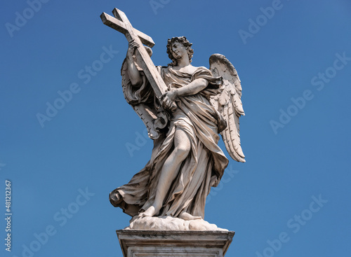 Angel with the Cross statue on St. Angelo Bridge (Ponte Sant'Angelo) in Rome, Italy.