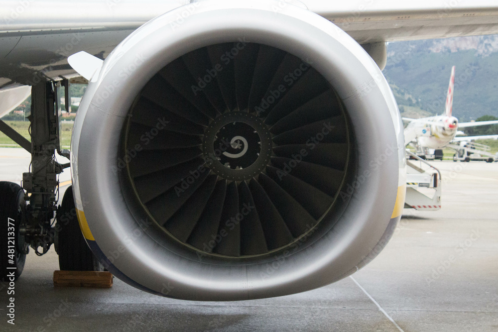 evocative close-up image of the turbine front of a 737 aircraft evocative close-up image of the turbine front of a 737 aircraft
