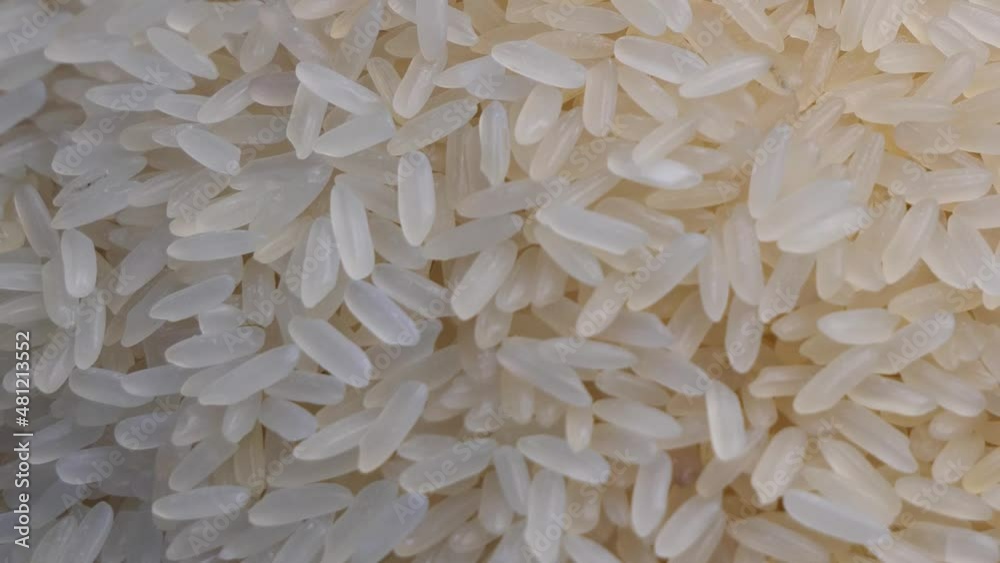 White rice grains, macro video. Rice, full frame.
White rice grains, macro video. Rice, full frame.