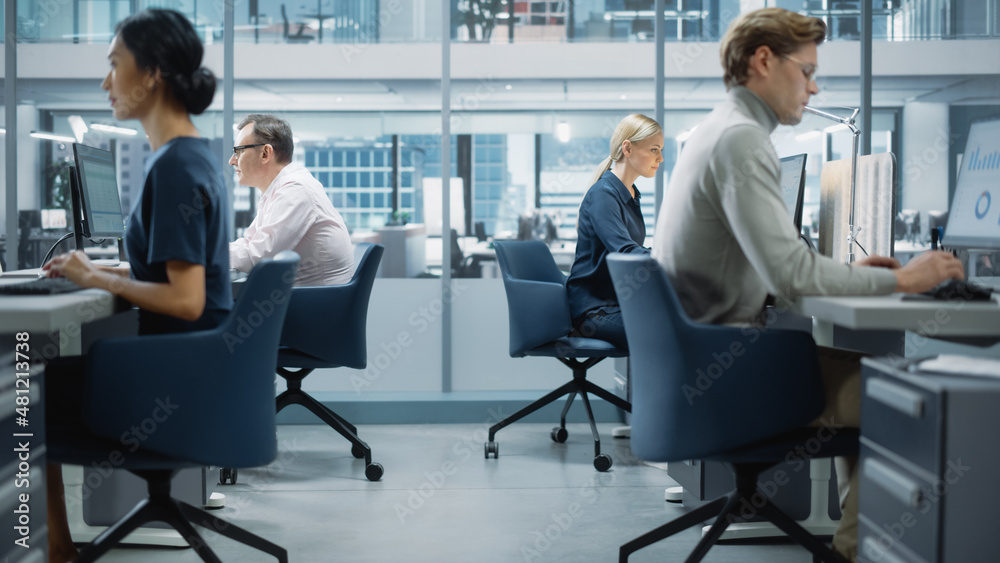 Diverse Team of Finance Managers Working with Statistical Data in Modern Big City Office. Colleagues Work on New Business Opportunities, Evaluate Financial Reports, Plan Investment Strategy. Diverse Team of Finance Managers Working with Statistical Data in Modern Big City Office. Colleagues Work on New Business Opportunities, Evaluate Financial Reports, Plan Investment Strategy.