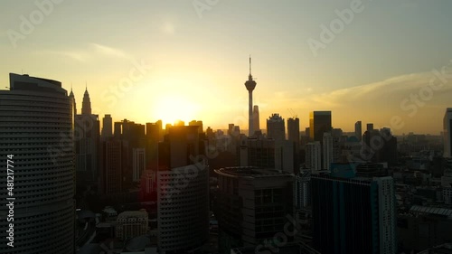 Aerial Footage sunrise view of Kuala Lumpur City Centre with four tallest skyscrapper  photo