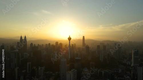 Aerial Footage sunrise view of Kuala Lumpur City Centre with four tallest skyscrapper  photo