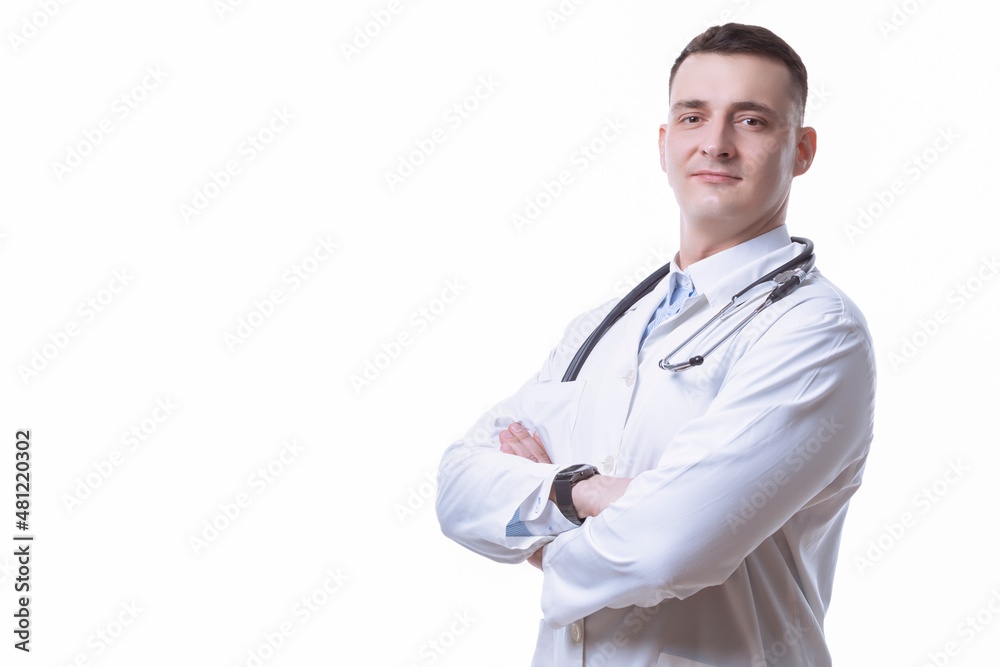 Medicine Concepts. Portrait of Professional Confident Male GP Doctor Posing in Doctor's Smock And Endoscope with Hands Folded Against White. Medicine Concepts. Portrait of Professional Confident Male GP Doctor Posing in Doctor's Smock And Endoscope with Hands Folded Against White.