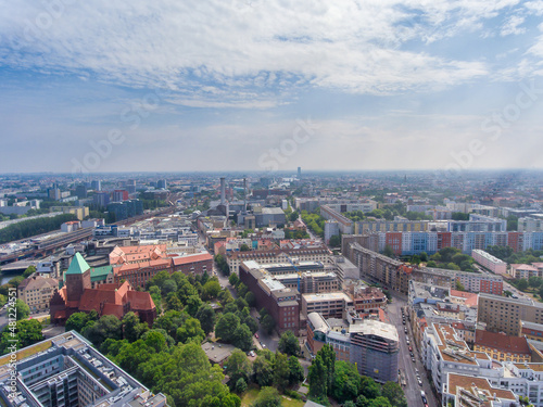 Aerial view of Berlin cityscape from drone in summer season with city landmarks and blue sky, Germany