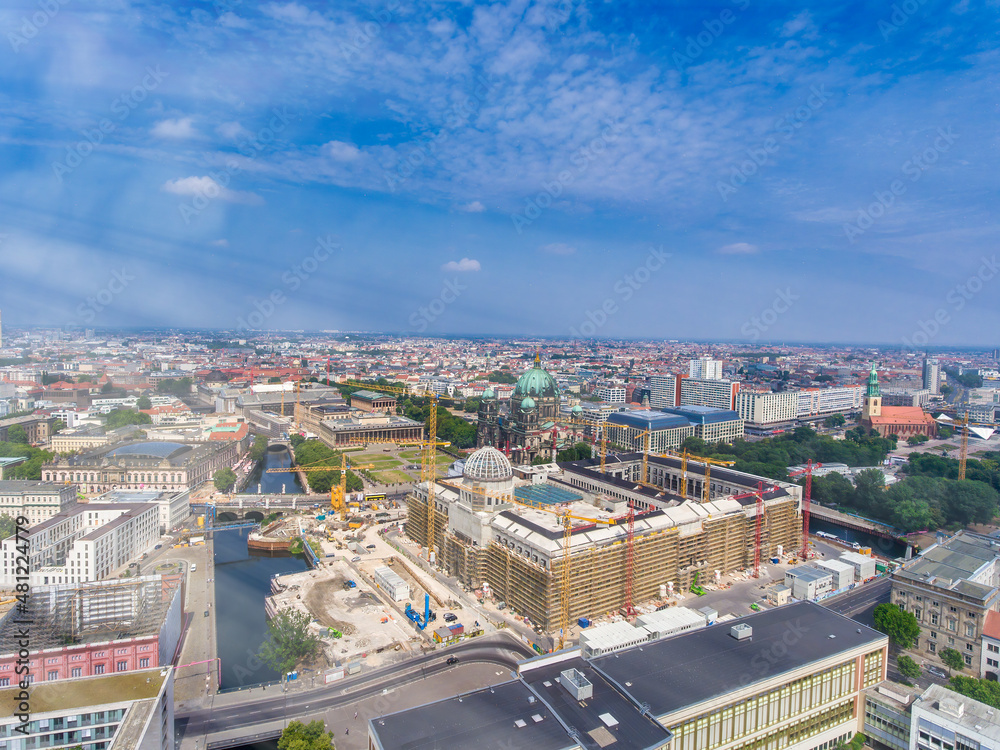 Aerial view of Berlin cityscape from drone in summer season with city landmarks and blue sky, Germany