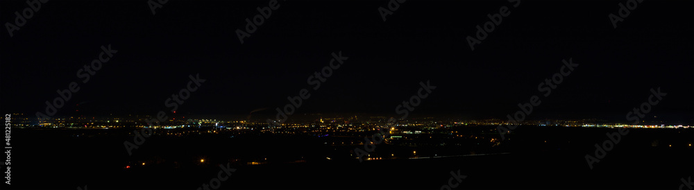 Panoramic view to city Ceske Budejovice at night with dark sky. Czech republic, long exposure