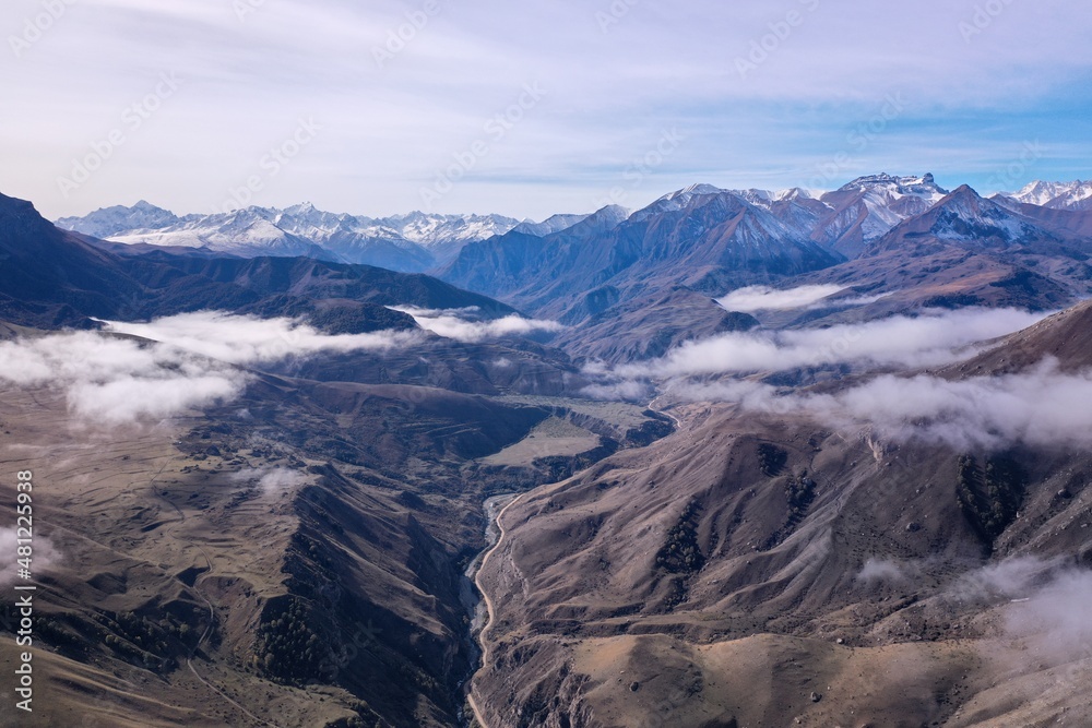 aerial view of clouds in the mountains