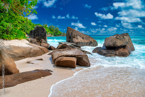 Rocks and trees on the ocean, beautiful sunny day in Seychelles.