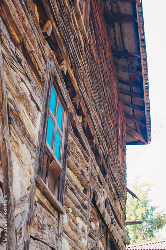 Historical Ottoman House. Wooden textured walls, wooden window and wooden beam.