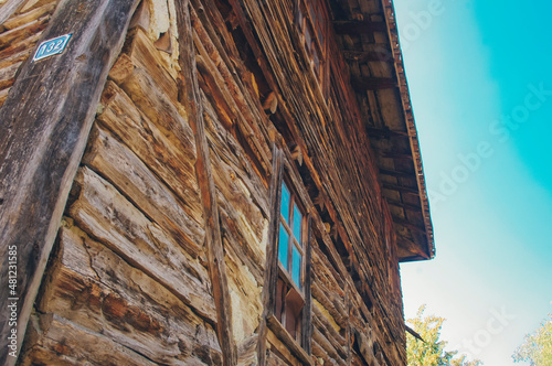 Historical Ottoman House. Wooden textured walls, wooden window and wooden beam.