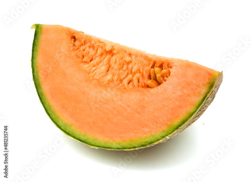 Cantaloupe melon slices on white background 