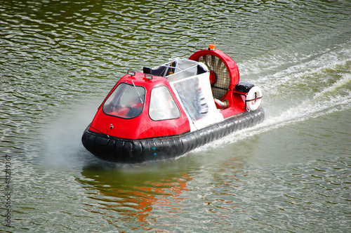 Foto Hovercraft on river. Warta river, Poznan, Poland.
