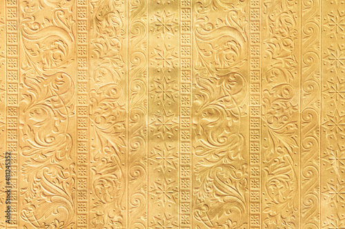 Gold embossed textured material background