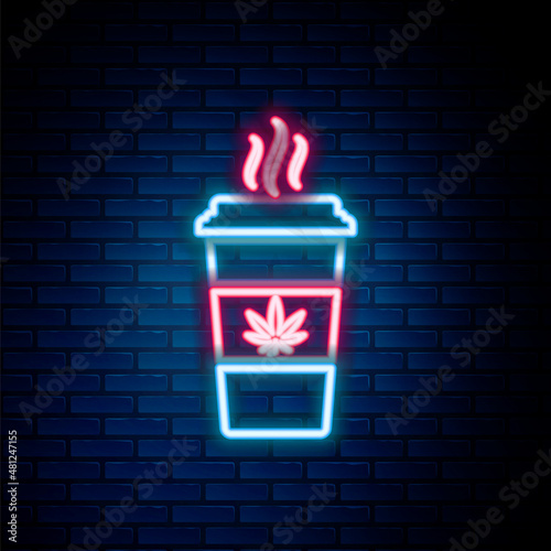 Glowing neon line Cup coffee with marijuana or cannabis leaf icon isolated on brick wall background. Marijuana legalization. Hemp symbol. Colorful outline concept. Vector
