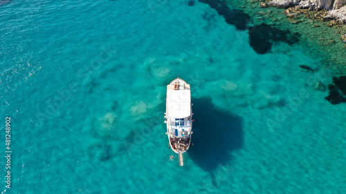 Aerial drone photo of beautiful emerald crystal clear beach and rocky bay of Plathiena  Milos island  Cyclades  Greece