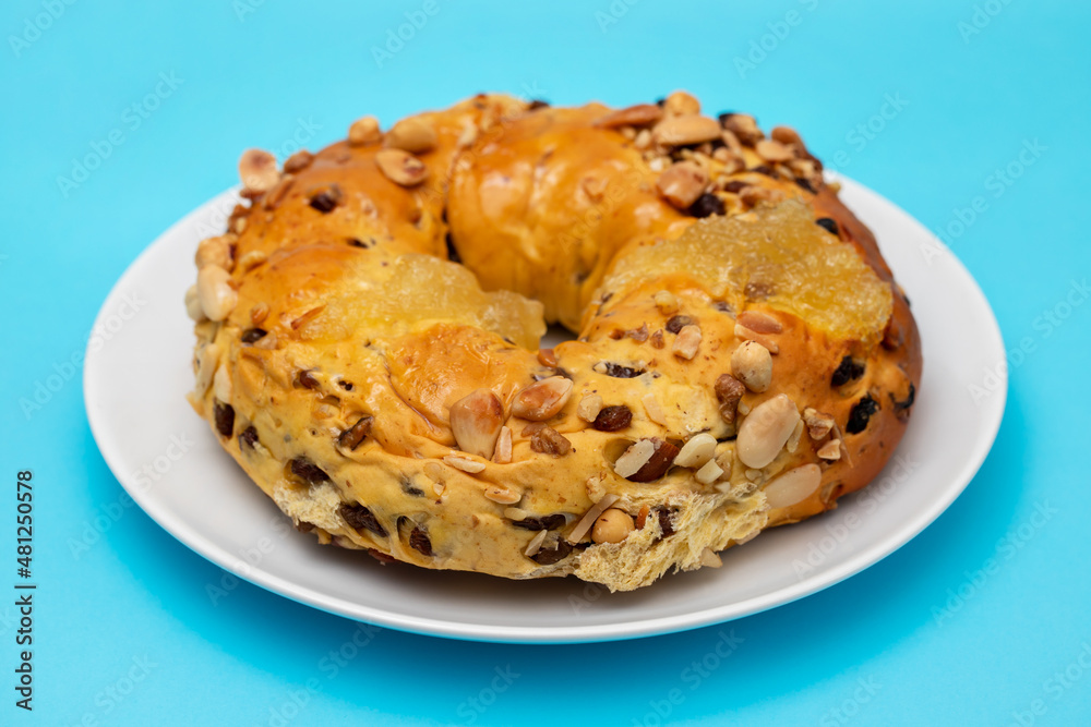 typical portuguese fruit cake Bolo rainha on white dish typical portuguese fruit cake Bolo rainha on white dish