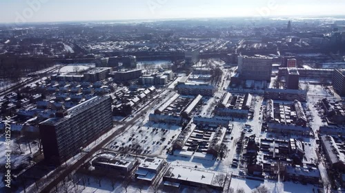 Winter aerial view of a snow covered residential Holland