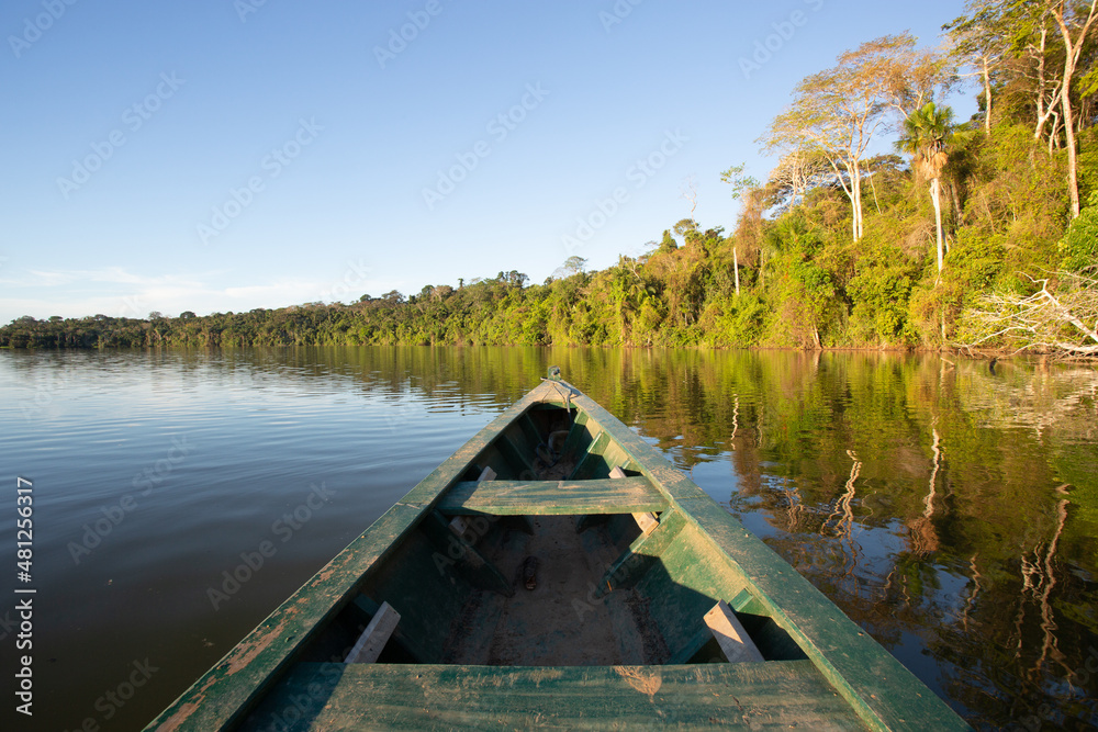 Canoe in the Amazon rain forest river. Canoe in the Amazon rain forest river.